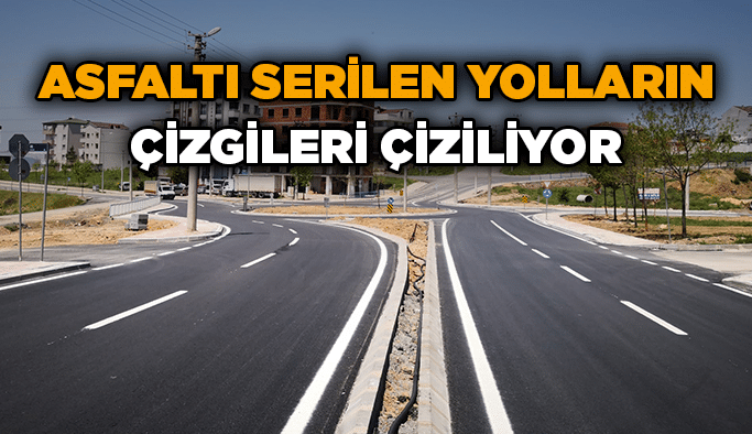 Asfaltı serilen yolların çizgileri çiziliyor