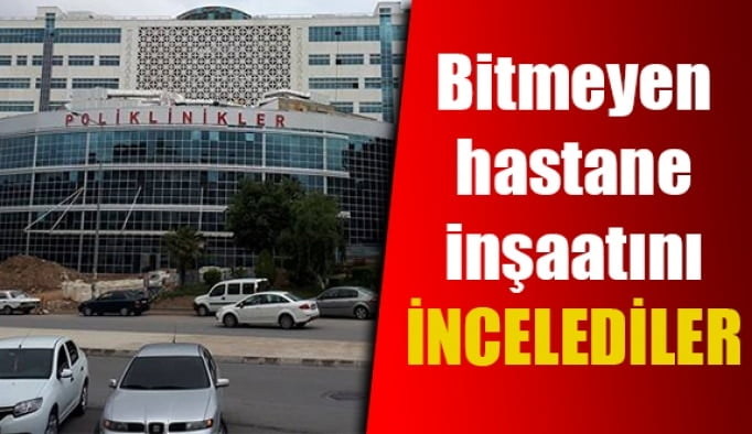 Bitmeyen hastane inşaatını incelediler